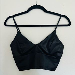 Black leather crop top.